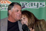 New Tampa Bay skipper Lou Piniella hugs his wife Anita before being
introduced to the media Monday in St. Petersburg, Fla. Piniella
asked to be released from his contract with the Seattle Mariners to
work closer to home.