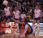 KU's Jill Dorsey digs the ball as Josiane Lima (10), Andi Rozum (9)
and Jennifer Kraft watch. Missouri defeated the Jayhawks on
Saturday night at Horejsi Center.
