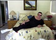 Max Baer Jr., who once played Jethro Bodine in "The Beverly
Hillbillies" television series, relaxes at his Las Vegas home. Baer
plans to lead the "Hillbillies" to prominence again after 30 years
of relative obscurity by signing a deal to produce penny slot
machines featuring the show.