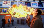 rob maloney, of East Bridgewater, Mass., practices breathing fire
during class at Sideshow School in New York. The school, taught in
Brooklyn's Coney Island, provides a rare chance for aspiring
fire-eaters, sword-swallowers and human blockheads to learn the
disappearing tricks of the venerable trade.