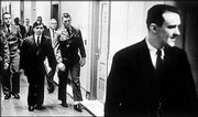 Convicted killers Perry Smith, left in suit, and Richard Hickock,
right, walked down the hall of the old Federal Building in Topeka
in 1963 on their way to an unsuccessful appearance in U.S. District
Court to overturn their 1960 conviction. They were sentenced to
death for the 1959 murders of four members of the Herbert Clutter
family in Holcomb. An appeal to the Kansas Supreme Court was also
denied. The subjects of Truman Capote&squot;s "In Cold Blood," they were
hanged April 14, 1965, at the Kansas State Penitentiary in Lansing.
