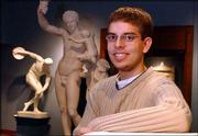 Paul Haverstock, a freshman at Kansas University, is majoring in
classical languages, Latin and Greek. He also is a guard at the
Classics Museum in Lippincott Hall, which he says is the perfect
place to read his Latin text.
