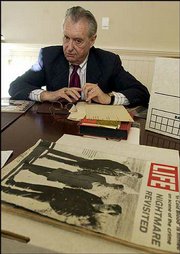 CHUCK MCATEE, former state director of penal institutions, has
compiled a collection of memorabilia from Perry Smith and Richard
Hickock, two of the last inmates to be executed in Kansas. McAtee,
now an attorney in Topeka, led the department when the two were
executed.