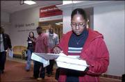 Charolette Dolman, an employee of Sprint PCS in Lawrence, was one
of about 500 Sprint employees who were laid off in June.