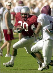 Washington State running back Jermaine Green runs during Friday's
practice at the Coliseum in Los Angeles. Washington State will play
Oklahoma on Wednesday in the Rose Bowl.