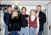 Reunited at last. Richard Ray, Lawrence, meets with his sister,
Debbie Douglass, and half-siblings for the first time. Adoption
tore them apart, but after searching for his family for a year and
a half, Ray gathered all the siblings Dec. 7 in Lawrence. Back row,
from left, are Ray; Doug Ochs, Rogers, Ark.; and Dennis Phelps,
Wichita. Front row, from left, are Debbie Douglass, Elbright,
Colo., and Julie Castillo, Wichita. Ray submitted the picture.