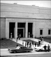 Patrons gather outside Kansas University&squot;s Helen Foresman Spencer
Museum of Art for the museum&squot;s grand opening gala on Jan. 17, 1978.
In his inaugural address, Seymour Slive, then-director of Harvard
University&squot;s Fogg Art Museum, called the Spencer "a gem of a
museum." The Spencer celebrates its 25th birthday this year.