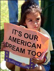 Vianney Rubio, 5, of Santa Ana, Calif., holds a sign at a rally to
protest the arrests of Hispanic immigrant workers at Southern
California airports, Aug. 23, 2002, in Santa Ana. Hispanics have
surpassed blacks as the nation's largest minority group, the Census
Bureau said Tuesday. The Latino population grew to 37 million in
July 2001, up 4.7 percent from April 2000. The black population
increased 2 percent during the same period to 36.1 million.