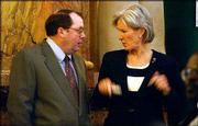 Gov. Kathleen Sebelius, right, talks with Senate Minority Leader
Anthony Hensley, D-Topeka, at the Statehouse. Sebelius said Monday
she was encouraged by January&squot;s preliminary tax collection figures,
which showed the state falling short of expectations by about $6
million. Hensley added: "It&squot;s not good, but it&squot;s not as bad as we
expected."