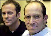 Cantor Fitzgerald Chairman Howard Lutnick, right, worked with his
friend, novelist and journalist Tom Barbash, left, to write "On Top
of the World." The book is based on Lutnick's experience of losing
658 of his employees in the World Trade Center attacks.