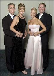 Dan and Jill Blomgren, Lawrence, left, and their friends Kristine
and Jason Townsend, Leawood, attend the Rock Chalk Ball. The Kansas
University fund-raiser was Feb. 7 at the Overland Park Convention
Center and Sheraton Hotel.