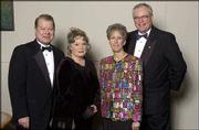 Pictured during Rock Chalk Ball 2003 are, from left, Dale
Seuferling, president of the Kansas University Endowment
Association; his wife, Marianne Seuferling; Linda Williams and her
husband, Fred Williams, president of the Kansas University Alumni
Association. The event featured cocktails, a silent and live
auction, Scholars Salute, dinner and dancing.