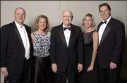 Pictured, from left, are Rob and Amy Cleavinger, Baldwin; Kansas
University Chancellor Robert Hemenway, Lawrence; and Katie and Dave
Barber, Overland Park; during the Rock Chalk Ball. The fund-raiser
was presented by the Greater Kansas City Chapter of the KU Alumni
Association.