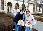 Volunteers for a newspaper recycling program at Central Junior High
School display some of their efforts outside the school. Back row,
from left, are Brianna Nelson-Overs, 14, daughter of Cindy Nelson;
Thai Pongmee, 15, daughter of Laura and Yudthana Pongmee; and
Mahleea Satomi, 15, daughter of Robert Rose. Front row, from left,
are Kelsie Reyes, 15, daughter of Yolanda and Tiburcio Reyes; and
Michelle Conley, 15, daughter of Gilda and Johnny Beane. The girls
gather and carry newspapers to the curb weekly in a recycling
effort started by Central's library and student council. Got a shot
for Friends & Neighbors? Send it, along with your name, phone
number and caption information, to Friends & Neighbors, P.O.
Box 888, Lawrence 66044.