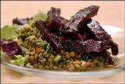 Honey balsamic and beet salad served over Lentil Salad With Curry
Spices is one of many flavorful dishes in the deli of the Community
Mercantile Co-op, 901 Iowa. The Mercantile recently hired Sula
Teller as the new food service manager.