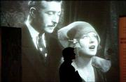 A man is silhouetted against a scene from the movie "The Jazz
Singer" in New York&squot;s Jewish Museum. The film is part of a new
exhibition devoted to Jewish actors and pioneers in the movie
industry, running through Sept. 14 at the museum.