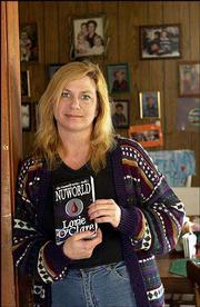 Laurie fitzgerald's first book, "Nuworld," was published in January
and is the first in a six-book romance/science fiction series.
Fitzgerald published the books under the pen name Lorie O'Clare.