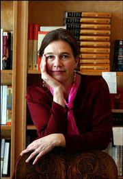 Author Louise Erdrich poses in Birchbark Books, the bookstore she
owns in south Minneapolis. Erdrich explores her European roots in
her newest book, "The Master Butchers Singing Club."