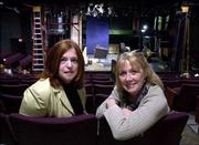 Mary Valentis, a University at Albany English professor, left, and
Capital Repertory Theater artistic director Maggie
Mancinelli-Cahill pose at the theater in Albany, N.Y. The two are
working on The Technology Play Project, which updates an ancient
dramatic form by staging plays through contemporary devices like
computers.