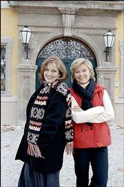 From left, Angela Cartwright (who played Brigitta von Trapp in "The
Sound of Music") and Heather Menzies-Urich (Louisa von Trapp) pose
in front of the Schloss Frohnburg in Salzburg, Austria, which
doubled as the von Trapp family villa in the movie. The Travel
Channel is visiting such locations with its series "Movie Lover's
Road Trip," which begins at 8 p.m. April 3 on Sunflower Broadband
Channel 71.