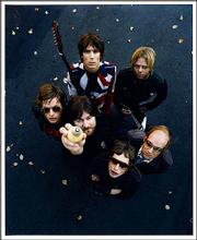The Soundtrack of Our Lives guitarist Mattias Bärjed, top center,
says the Swedish band is teaching "Americans how to play rock and
roll again."