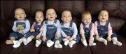 The Headrick sextuplets are seen in their Rago home. The siblings,
from left, Ethan, Melissa, Grant, Sean, Jaycie and Danielle were
born the day after a set of quadruplets were delivered nearly a
year ago in Wichita.