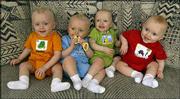 The Tetrick quadruplets, two sets of identical twins, are seen in
their Wichita home. The brothers are, from left, Parker, Peyton,
Camden and Christian.