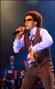 Tego Calderon performs in San Juan, Puerto Rico. Calderon laces
salsa and Puerto Rico's bomba rhythms of African ancestry with
hip-hop beats to deliver social critics and party songs filled with
local lingo and references to old-school acts.
