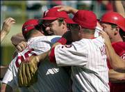 Philadelphia pitcher Kevin Millwood, center, celebrates as he is
congratulated by his teammates. Millwood tossed the ninth no-hitter
in team history in Sunday's 1-0 victory over San Francisco in
Philadelphia.