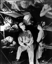 AMERICAN WAR CORRESPONDENT Ernie Pyle, center, talks with Marines
below decks on a U.S. Navy transport during World War II in March
1945. Pyle&squot;s life and words are the subject of the one-person show,
"Ernie Pyle&squot;s War."