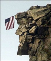 Above is a file photo of the Old Man of the Mountain, a natural
stone profile on Cannon Mountain that appears on everything in New
Hampshire from road signs to the state quarter. Below is its
profile Saturday, when it was discovered the famous formation had
collapsed.