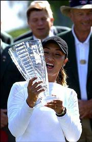 Grace Park celebrates her winning effort at the Michelob Light
Open. Park won Sunday by a stroke over Cristie Kerr in
Williamsburg, Va.