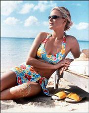Liz Claiborne Swimwear's "skirtkini" in a bold floral print
combines a brightly colored swimsuit with a functional silhouette,
both big trends this summer.