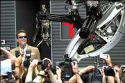 Arnold Schwarzenegger poses next to a robot for the promotion of
his new film "Terminator 3," directed by American Jonathan Mostow,
on the sideline of the 56th Film Festival in Cannes, France.
Saturday&squot;s appearance was for advance publicity; the film will not
be shown at Cannes.