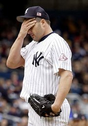 Yankees pitcher roger clemens frets during a game against the Red
Sox. Clemens has another shot at his 300th career victory today in
Detroit after he picked up the loss in an 8-4 Boston win in his
last start Monday in New York.