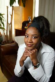 Author ZZ Packer poses at her home in Pacifica, Calif. Packer, 30,
has been published in every major literary journal and received
prestigious awards and rave reviews for her first collection of
short stories, "Drinking Coffee Elsewhere."