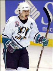 Anaheim's Paul Kariya yells after scoring in the second period.
After being helped off the ice following a hit by New Jersey's
Scott Stevens, Kariya helped the Ducks wins Game 6 of the Stanley
Cup finals, 5-2, Saturday in Anaheim, Calif.