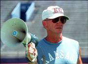 Don "Red Dog" Gardner will begin his 20th year of Red Dog's Dog
Days this week. Red Dog Days, as the annual community conditioning
program is more affectionately known, begins Tuesday at Kansas
University's Memorial Stadium.