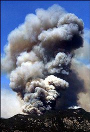 A wildfire continues to rage on top of Mount Lemmon near Tucson,
Ariz.. The wildfire that has destroyed more than 250 homes in the
mountaintop community of Summerhaven moved on a course Sunday that
will make it easier to fight, fire officials said.