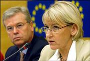 David Byrne, European Health commissioner, left, and Swedish
Environment commissioner Margot Wallstroem answer questions during
a news conference at the European Parliament in Strasbourg, France.
The European Parliament passed tough new rules on genetically
modified products.