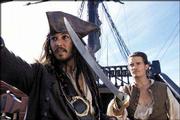 Capt. Jack Sparrow (Johnny Depp, left) and Will Turner (Orlando
Bloom) must join forces in a daring mission to rescue the
governor&squot;s daughter and recapture Sparrow&squot;s ship, the Black Pearl,
in Walt Disney Pictures&squot; "Pirates of the Caribbean: The Curse of
the Black Pearl."
