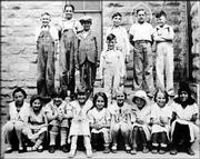 Bob Dole, second from right in the uppermost row, is pictured with
his fourth-grade class in Russell.