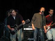 Todd Johnson, left, enjoys a live jam with Who singer Roger
Daltrey, center, at The Bottom Line in New York. Johnson, a
Lawrence musician, was chosen to attend the Rock 'N' Roll Fantasy
Camp after winning an all-expenses paid contest sponsored by
Rolling Stone magazine.