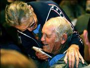 World War II veteran Desmond Doss, left, a conscientious objector
who served as a medic during the war, jokes with fellow
Congressional Medal of Honor recipient John Finn during a mayor's
banquet honoring the medal recipients in Shreveport, La., Sept. 10,
2002. Doss is scheduled to attend this weekend's dedication of the
Dole Institute of Politics.