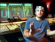 Film director Robert Rodriguez used a new three-dimensional camera
system developed for James Cameron's Titanic documentary, "Ghosts
of the Abyss," to shoot the third "Spy Kids" installment. "Spy Kids
3-D: Game Over" opens nationwide Friday.