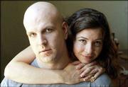 Adam Desnoyers, left, and Rebecca Curtis are the newest English
department faculty members at Kansas University. Both Desnoyers and
Curtis, who are pictured Wednesday in their Lawrence home, are
being honored by the 2003 O'Henry Awards Prize Stories anthology.
Desnoyers story, "Bleed Blue in Indonesia," will be printed with 19
others in the anthology; Curtis' "Big Bear, California" will be
included on a list of 15 recommended stories.