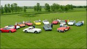Members of Lawrence Corvette Club pose for their first club photo.
The club meets every month on the third Thursday, and is sponsored
by Crown Chevrolet. Not all members of the group, which is made up
of Corvette owners and enthusiasts, were able to make it to the
photo session. The picture was taken by Doyle Coons, club
secretary.