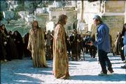 Mel Gibson, right, directs Jim Caviezel, center, and Caviezel's
double, left, on the set of "The Passion" in this Jan. 24 photo.
Seven months before its release, Gibson's self-made film is raising
concerns over his exclusionary screenings and his depiction of
Jews.