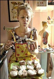 Writer, actress and comedian Amy Sedaris frosts cupcakes, which she
sells to a nearby coffee shop, in the kitchen of her New York
apartment. Sedaris has a new book out called "Wigfield." She also
has played roles in "Sex and the City," the film "Maid in
Manhattan" and Comedy Central&squot;s "Strangers With Candy."