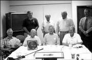 Lawrence Presbyterian Manor's Golf Committee discusses auction
items for the Soup and Pie Supper. Back row, from left, are Mike
McCormick, Ned Cushing, C.O. Nauman and Dave Bogner; front row,
from left, are Warren Corman, Russ Mosser, Martin Jones and Jack
Hinton. The group met Aug. 7 to talk about the fund-raiser, which
will be from 5 p.m. to 7:30 p.m. Sept. 16 at the manor, 1429 Kasold
Drive. The 10th annual golf tournament will be Sept. 18 at Eagle
Bend Golf Course. The deadline for registration is Sept. 12.